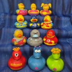 Fun Flock! 12 Super Hero and Alien Rubber Ducks